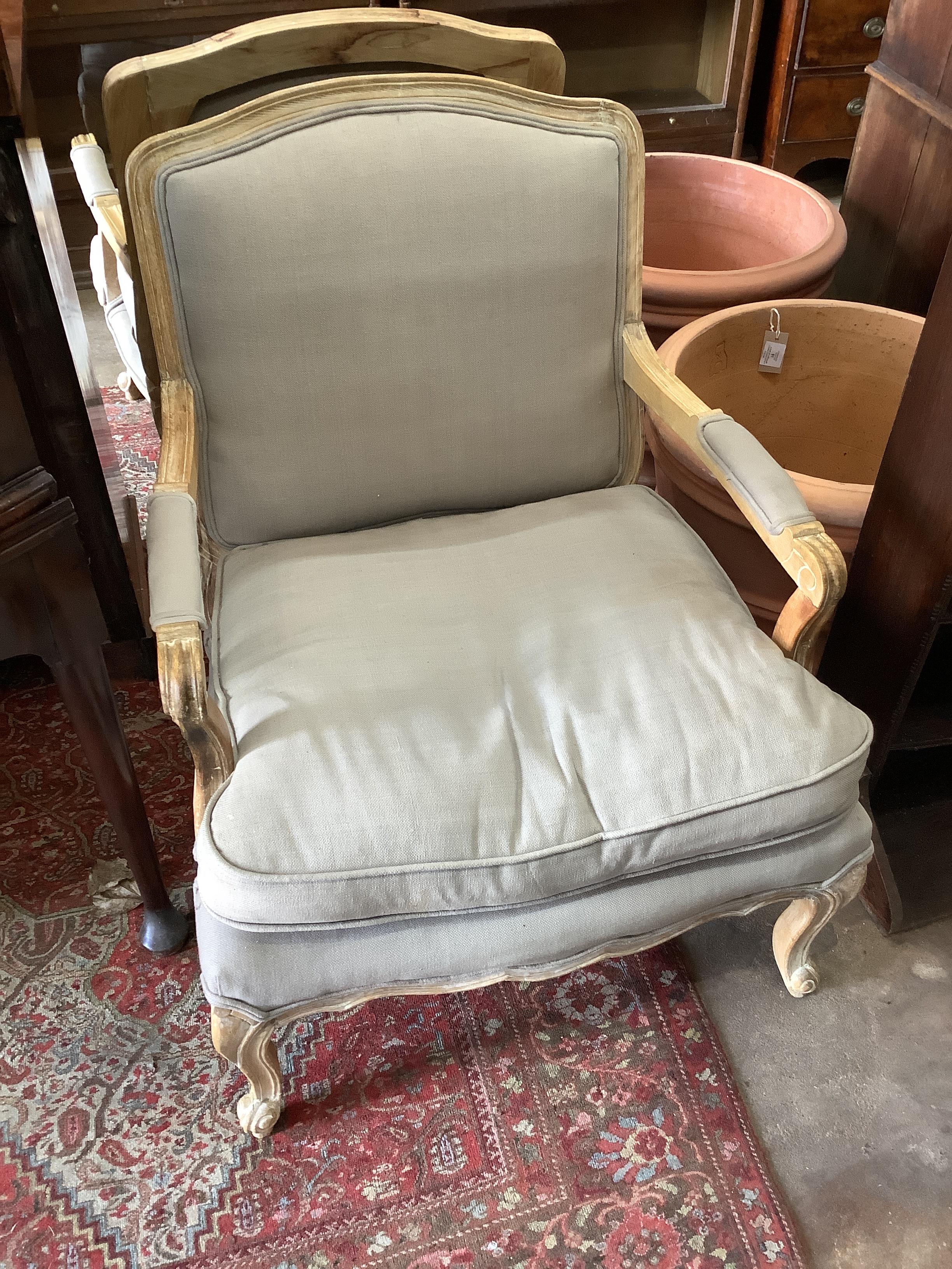 A pair of Louis XVI style upholstered open armchairs, width 68cm, depth 70cm, height 88cm *Please note the sale commences at 9am.